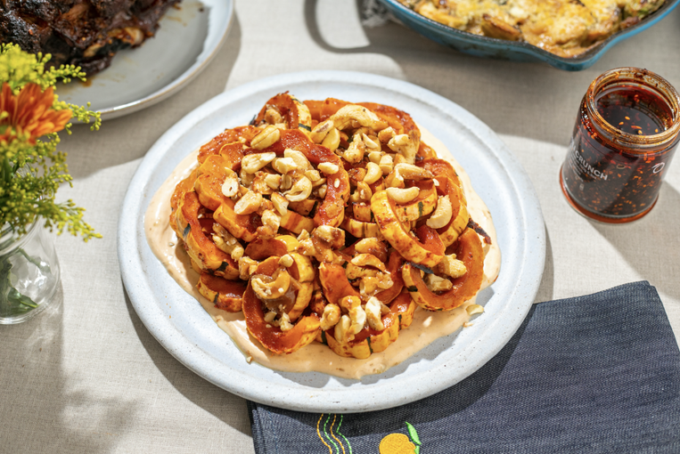 Spicy Roasted Delicata Squash with Chili Crunch Cream & Candied Cashews