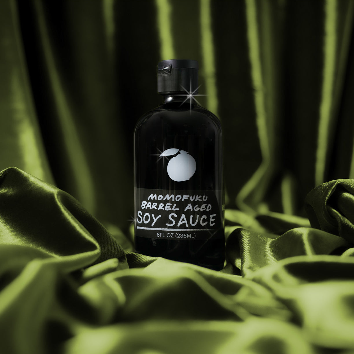 Barrel Aged Soy Sauce bottle on green background