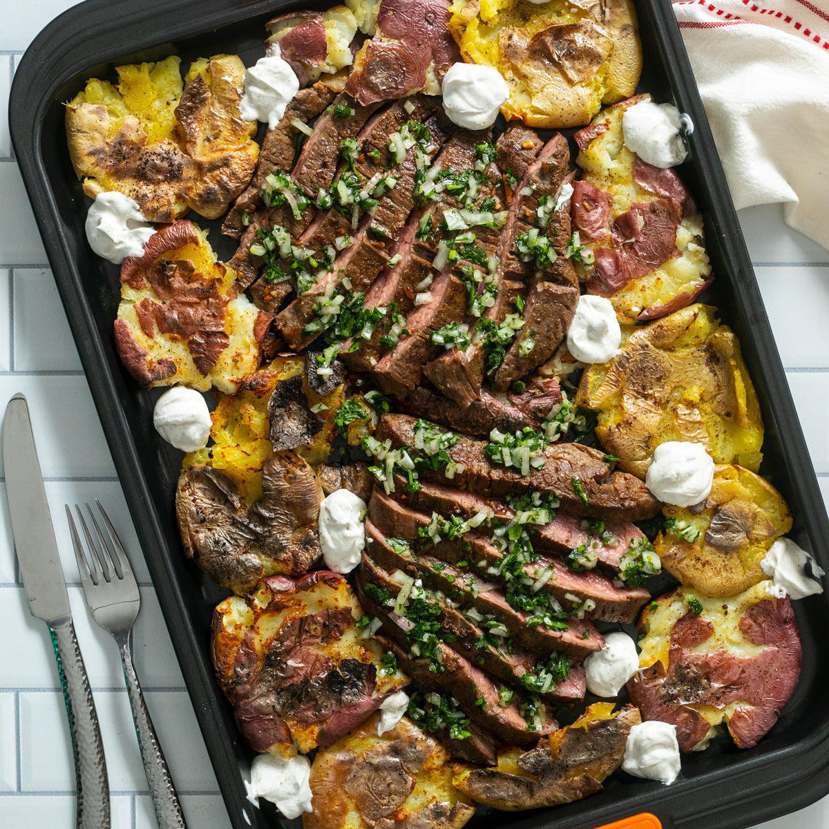 sheet pan with steak and smashed potatoes