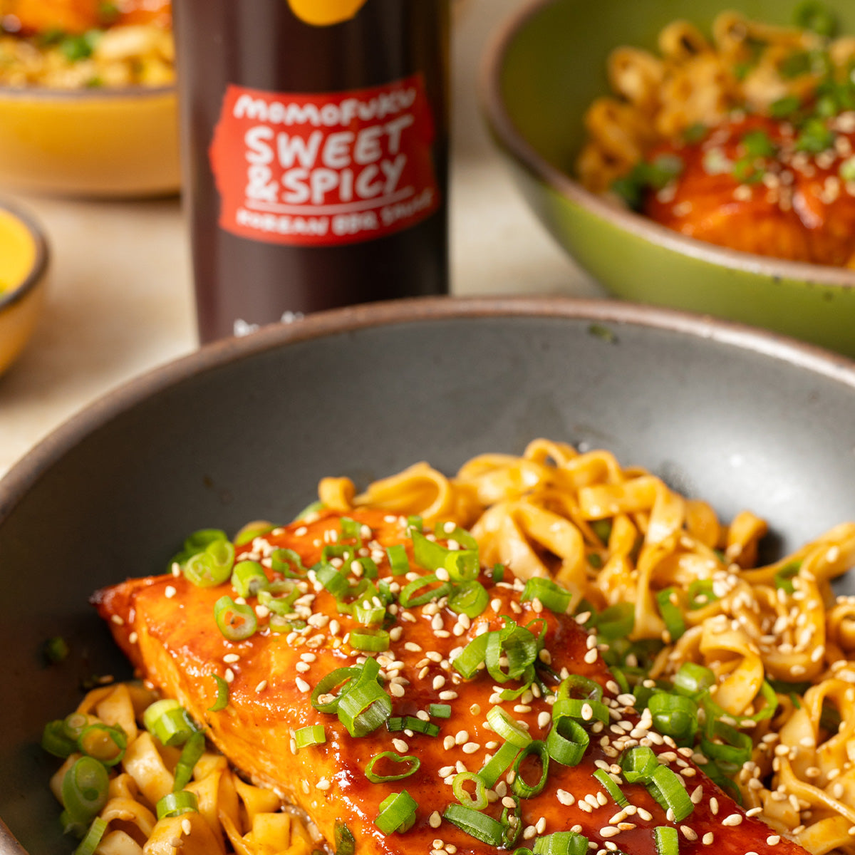 Sweet & Spicy salmon on top of noodles